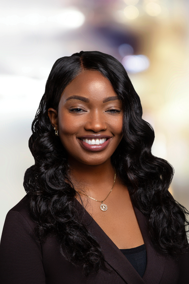 Portrait of Aicha Millien, REALTOR®.